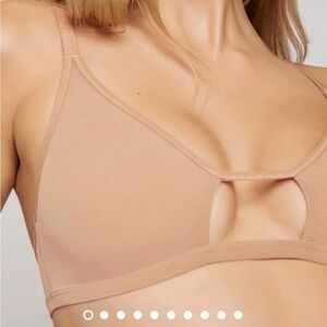 Negative Underwear Sieve cutout bra in size 0 (30a-32b)
Brand new, never worn